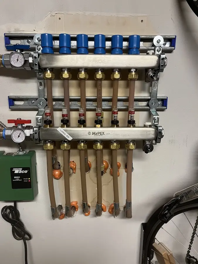 Plumber performing Gas Leak Detection at a residential property in Randolph